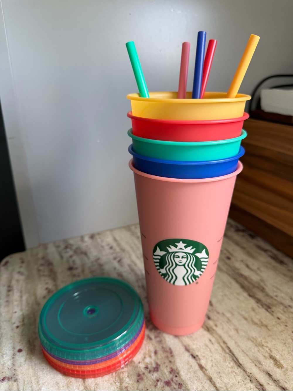Starbucks Pink Reusable Tumbler with Multicolor Lids and Straws